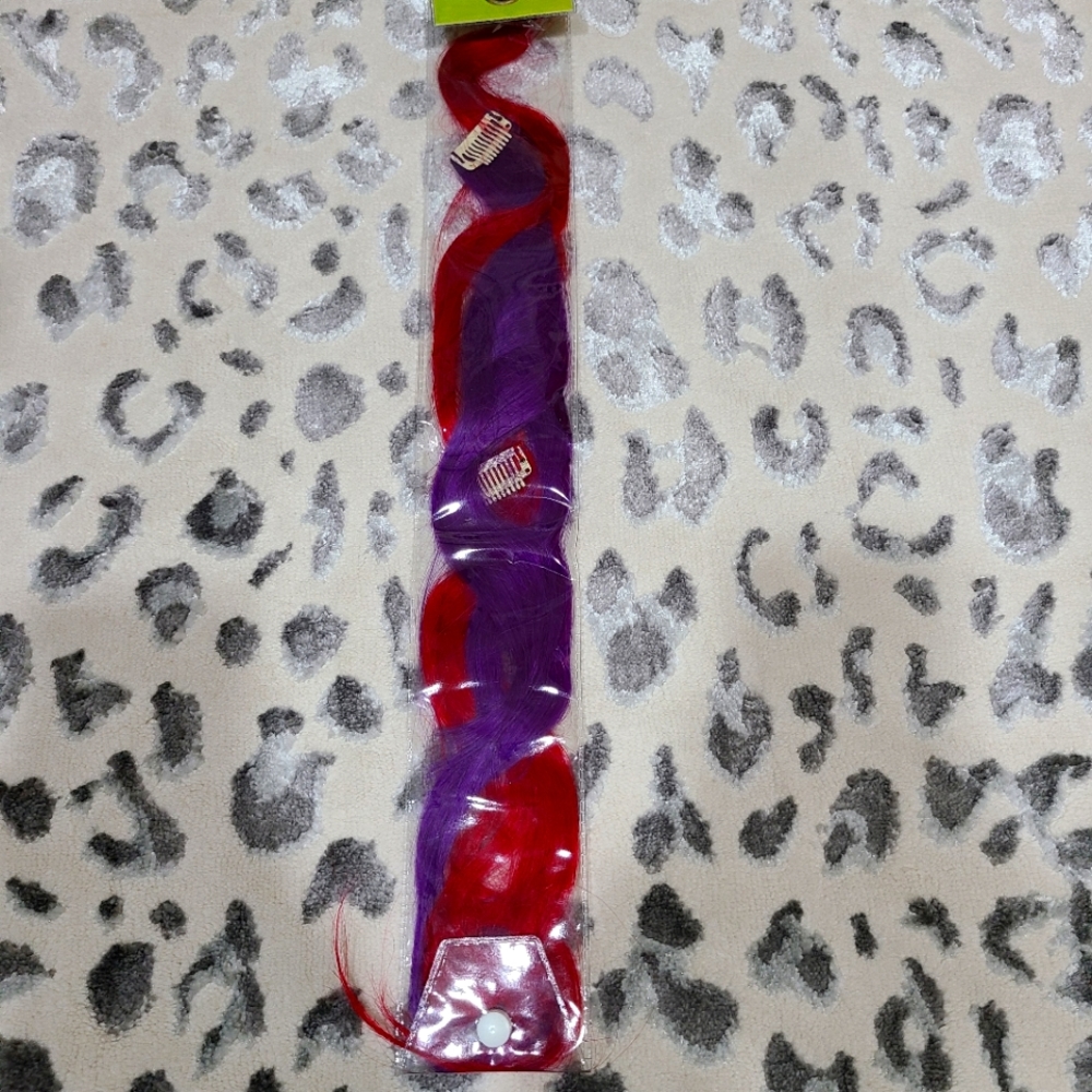 Pink and purple clip in hair extensions